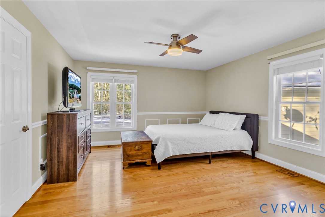 43 Ruddy Duck Road Heathsville, VA 22473 - Photo 22 of 46 a spacious bedroom with a bed and window
