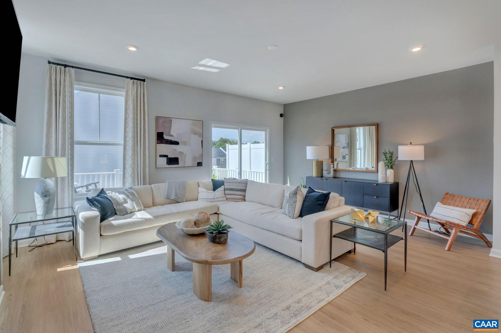 3002 Rambling Brk Lane Crozet, VA 22932 - Photo 2 of 44 a living room with furniture or couch and a wooden floor