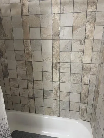 a bathroom with a bathtub