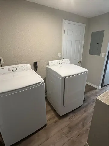 a utility room with dryer and washer