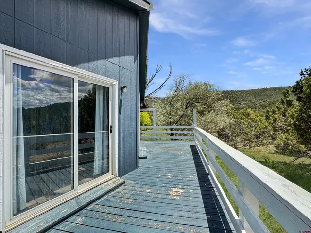 a view of balcony with workspace
