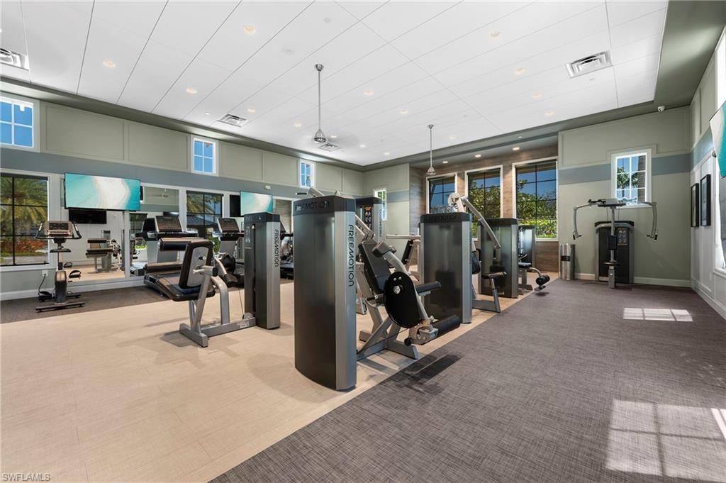 8897 Redonda Drive Naples, FL 34114 - Photo 38 of 42 a view of a room with gym equipment