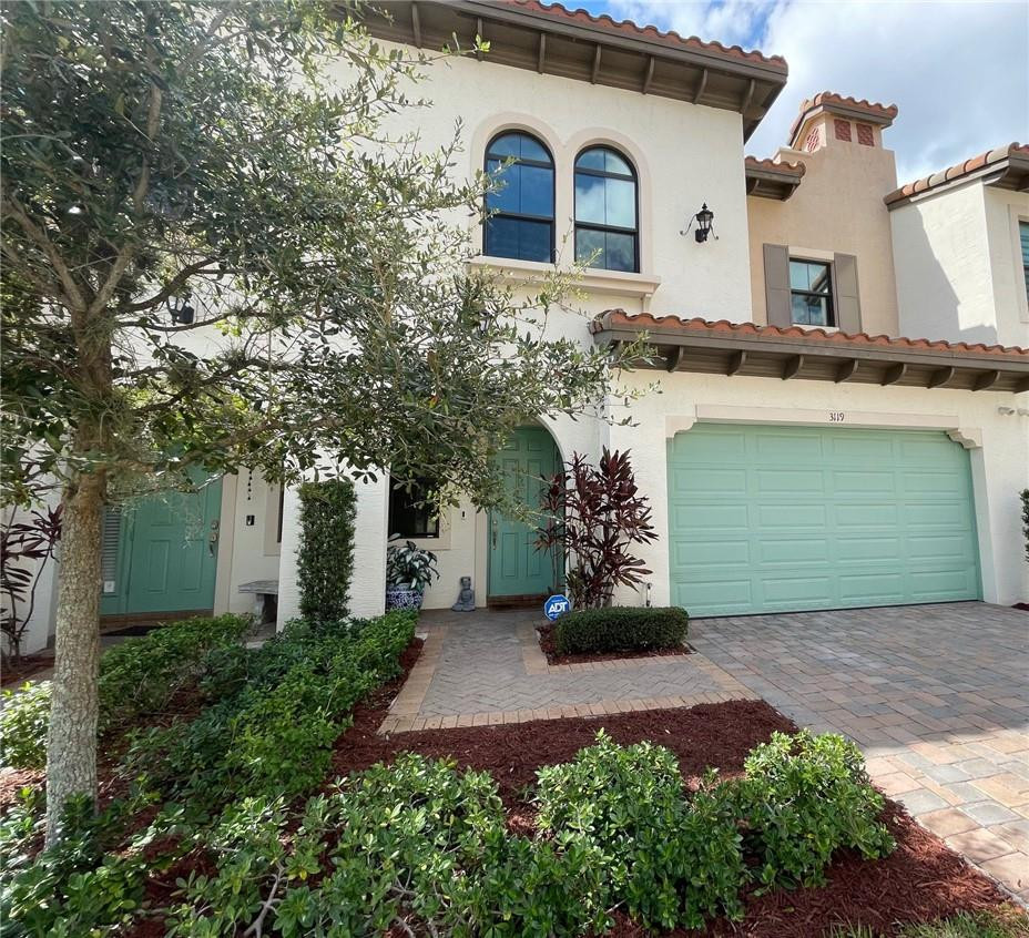 Undisclosed Address Sunrise, FL 33323 - Photo 2 of 88 a front view of a house with garden