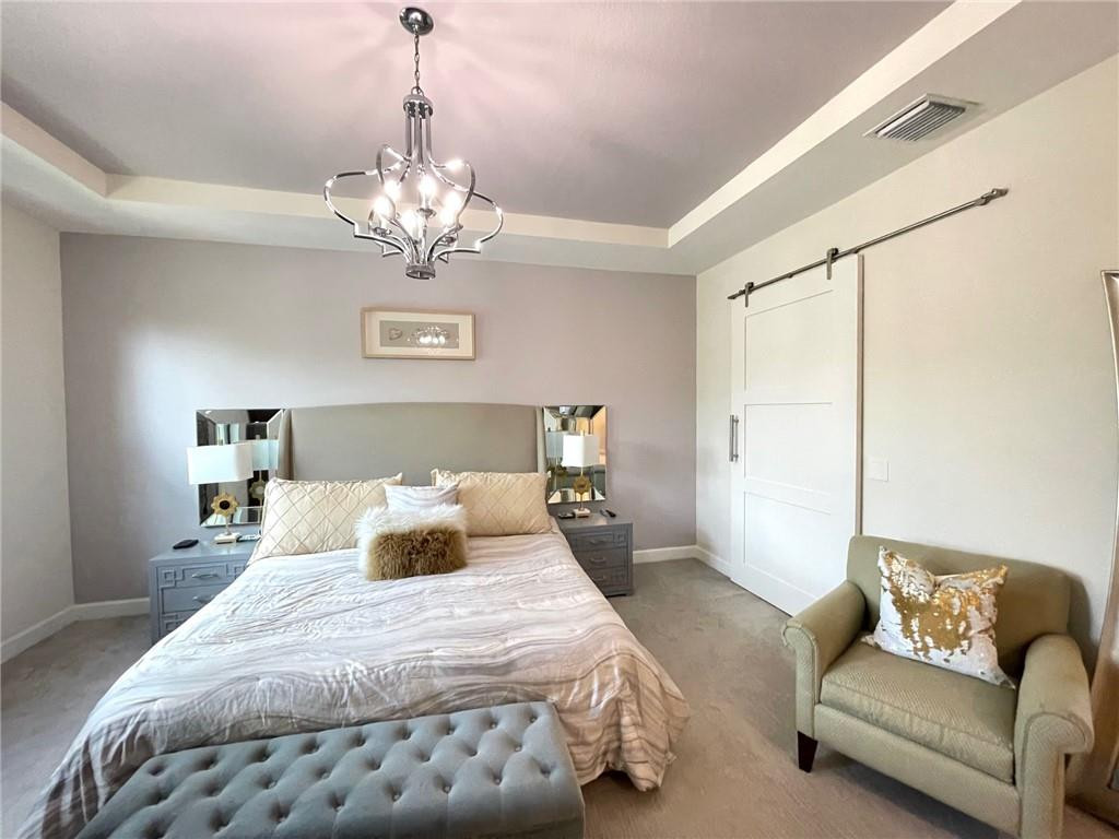 Undisclosed Address Sunrise, FL 33323 - Photo 36 of 88 a bedroom with a bed and ceiling fan