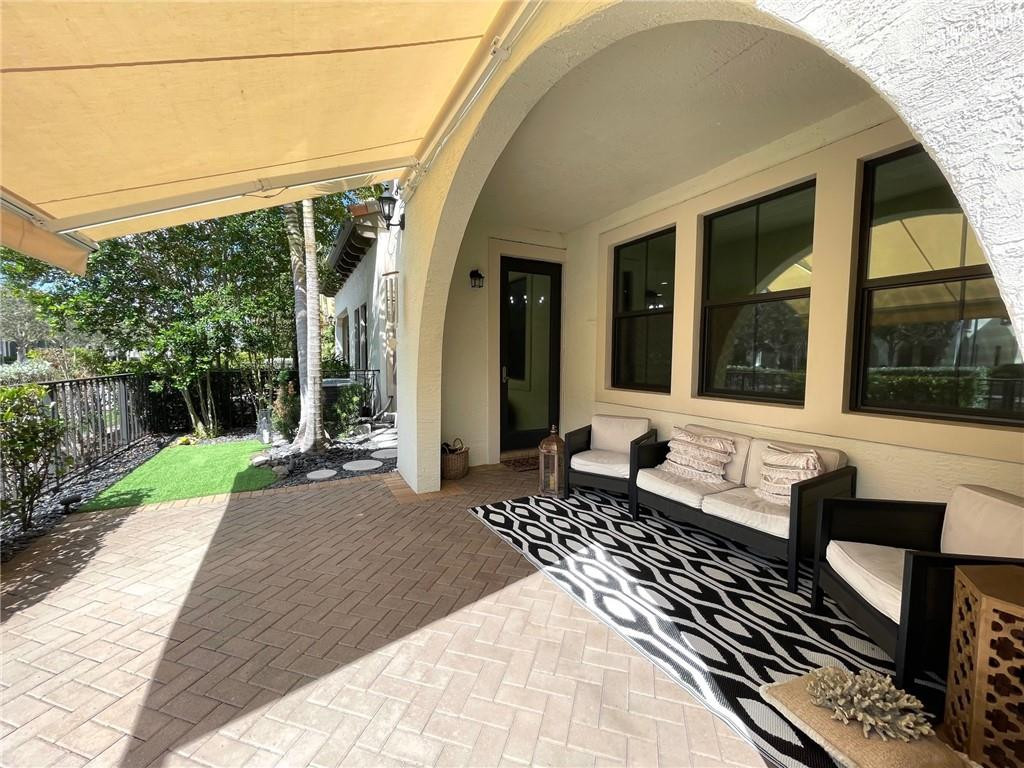 Undisclosed Address Sunrise, FL 33323 - Photo 86 of 88 a view of a house with backyard porch and sitting area