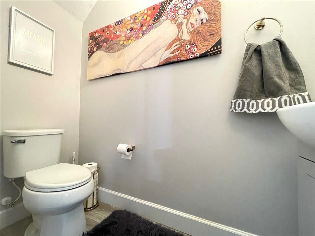 Undisclosed Address Sunrise, FL 33323 - Photo 9 of 88 a bathroom with a toilet and a view of bathroom