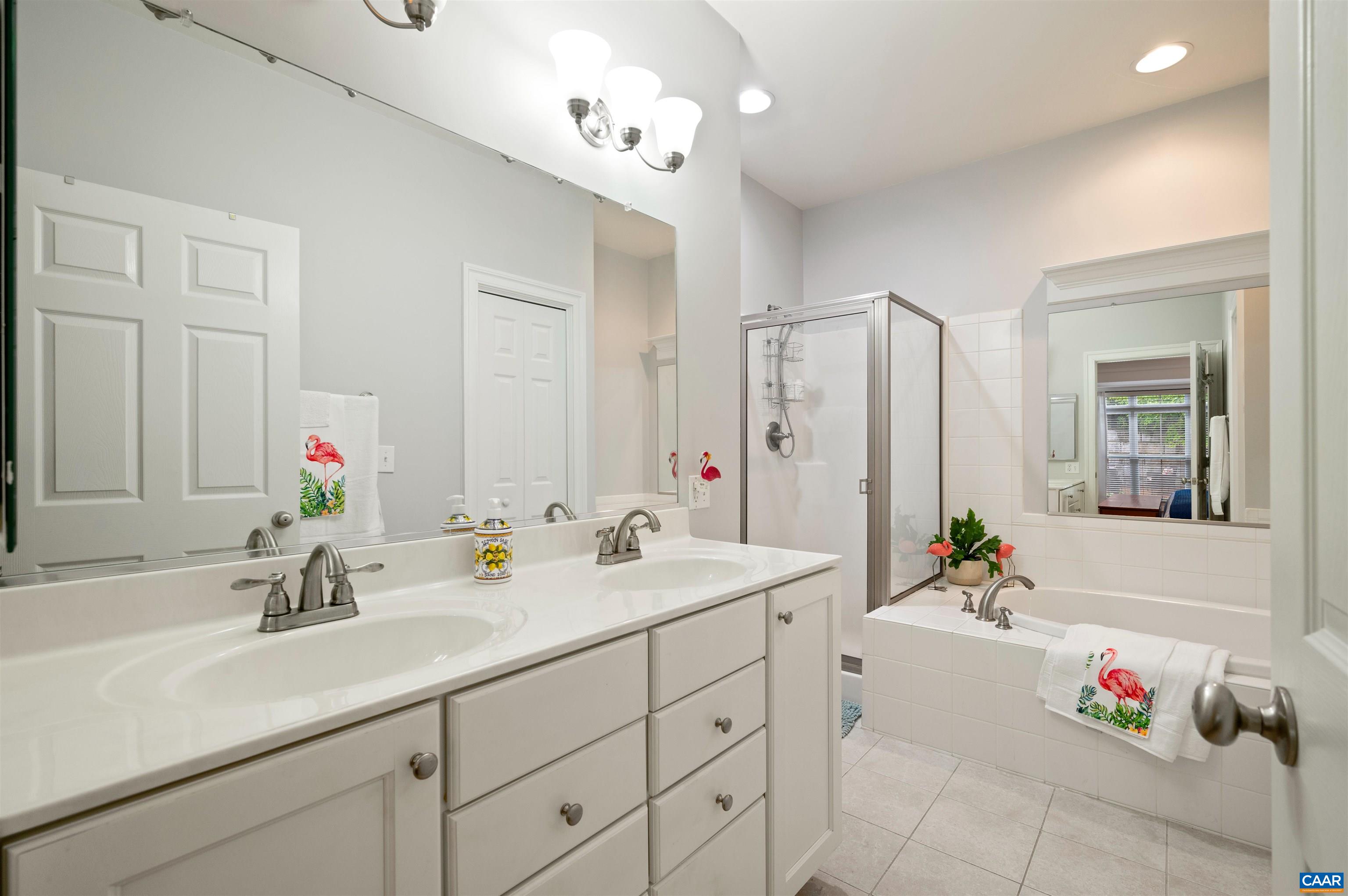4618 Mechums River Road Charlottesville, VA 22901 - Photo 34 of 44 a bathroom with a double vanity sink mirror and double