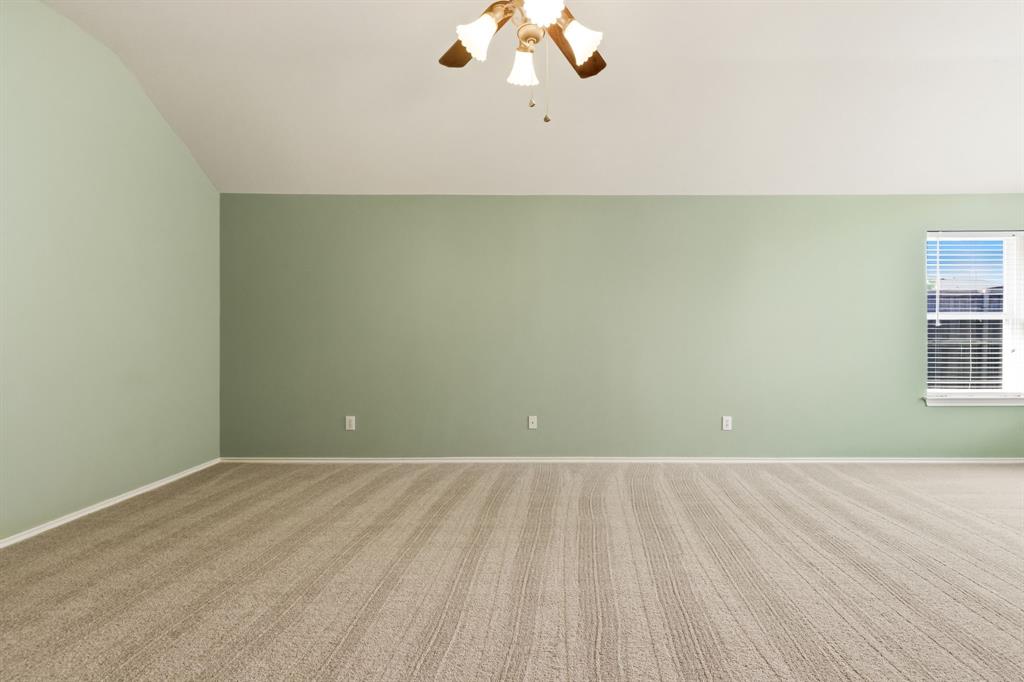 2210 High Point Drive Sachse, TX 75048 - Photo 17 of 23 a view of an empty room with a window