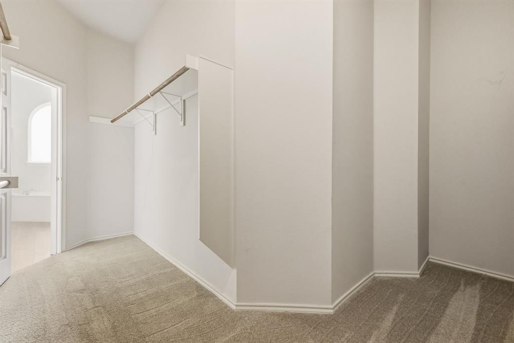 2210 High Point Drive Sachse, TX 75048 - Photo 21 of 23 a view of hallway with closet
