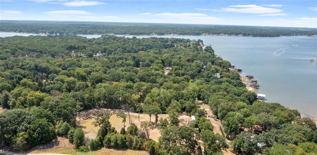 7204 Lance Eustace, TX 75124 - Photo 20 of 25 Aerial view featuring a water view and a forest view