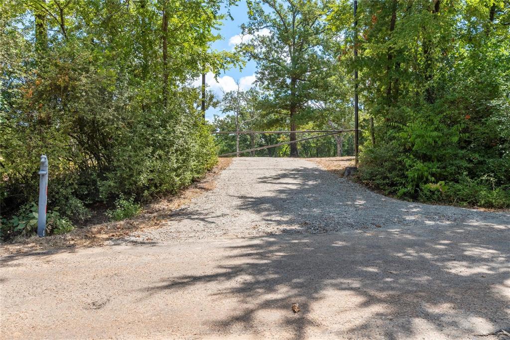 7204 Lance Eustace, TX 75124 - Photo 2 of 25 View of road featuring a gated entry