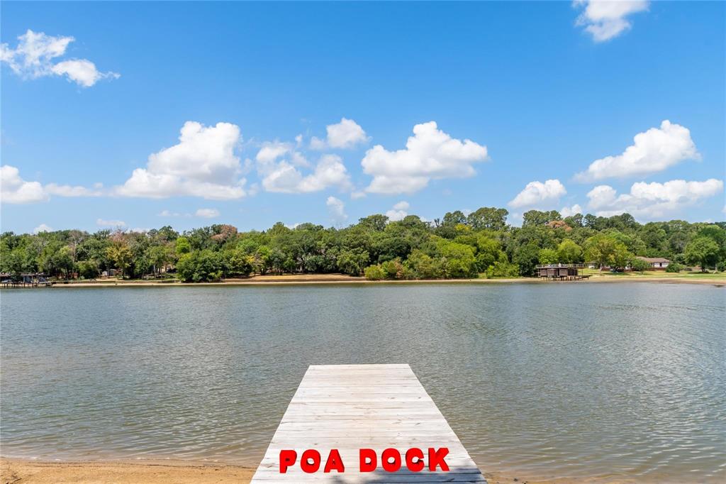 7204 Lance Eustace, TX 75124 - Photo 25 of 25 Dock area featuring a water view and a wooded view