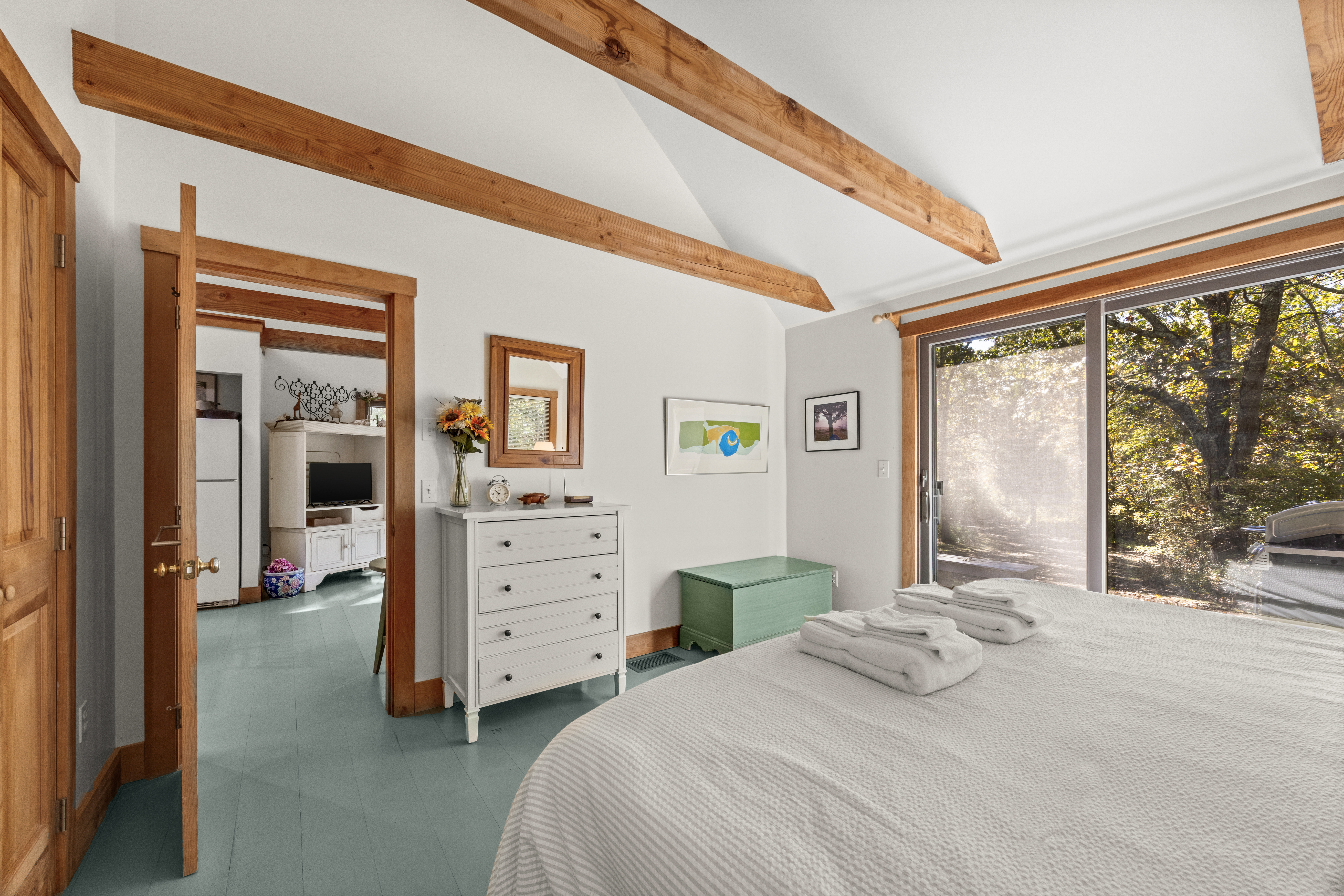 46 Tiercel Lane Chilmark, MA 02535 - Photo 11 of 20 a bedroom with a bed and a large window