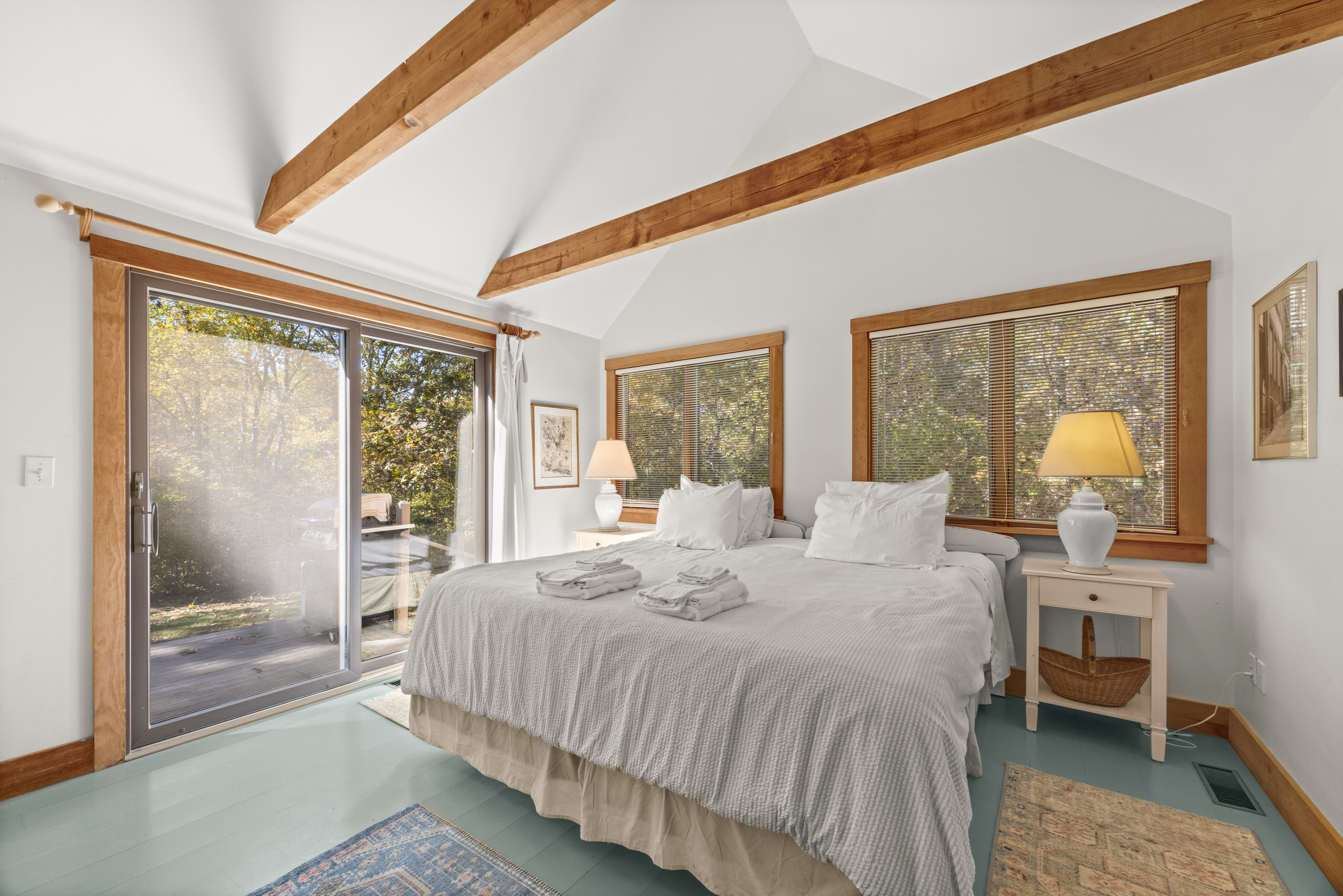 46 Tiercel Lane Chilmark, MA 02535 - Photo 10 of 20 a bedroom with a bed and wooden floor