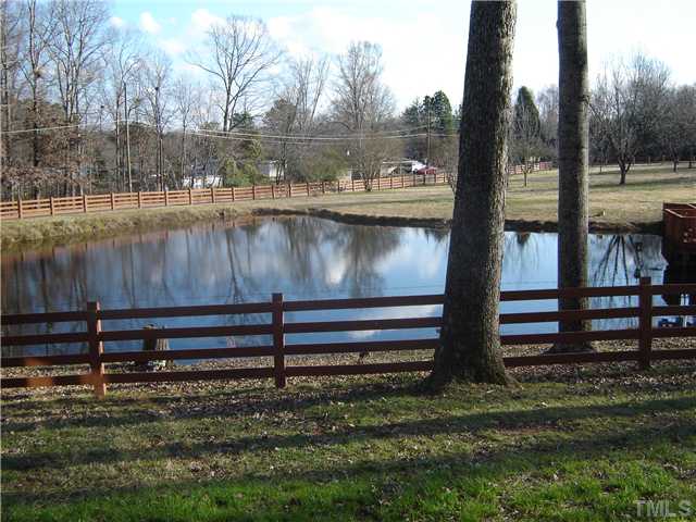 815 Goodwin Road Durham, NC 27712 - Photo 4 of 15 a lake view from a yard