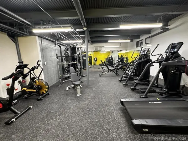 a view of a room with gym equipment