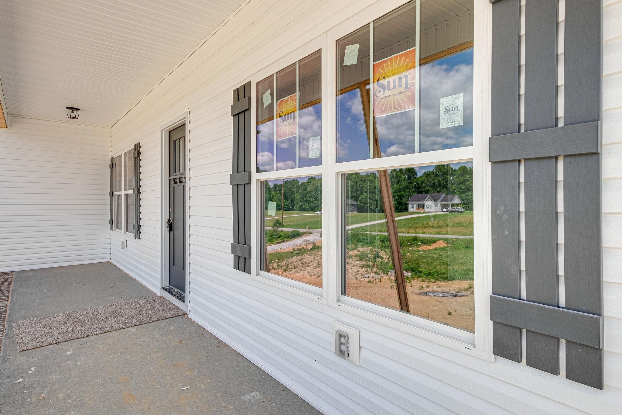 1195 Liberty Road Charlotte, TN 37036 - Photo 10 of 27 Farmhouse Plank Shutters ^ Farmhouse Windows (3 pane top)