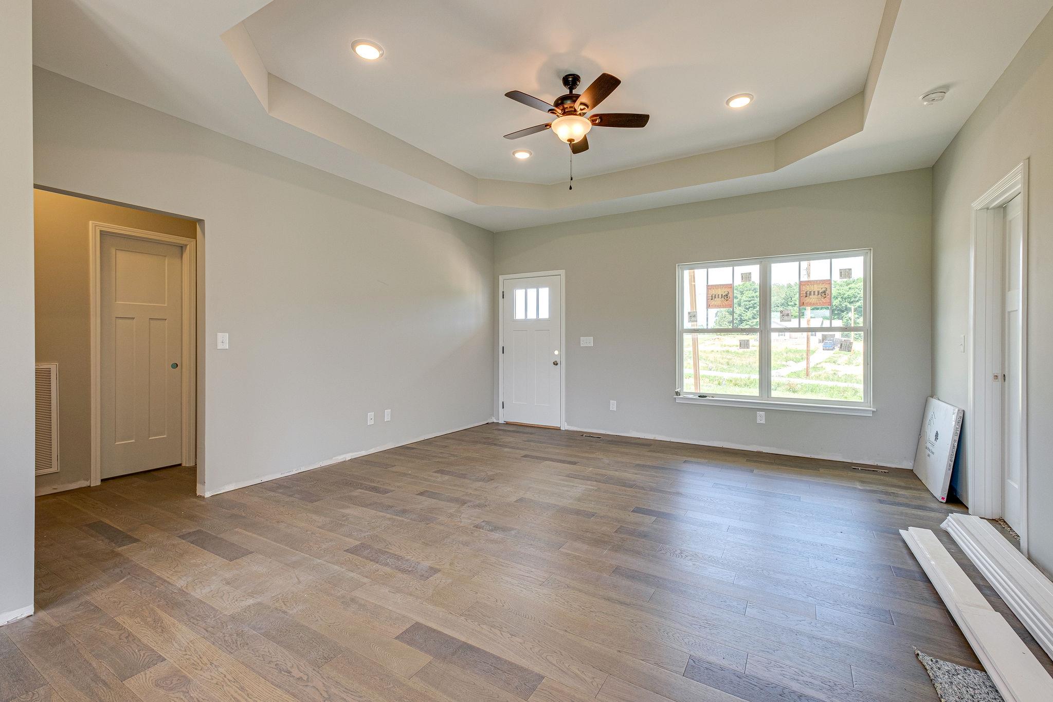 1195 Liberty Road Charlotte, TN 37036 - Photo 5 of 27 Great Room w/ Wide Plank Wood Floors