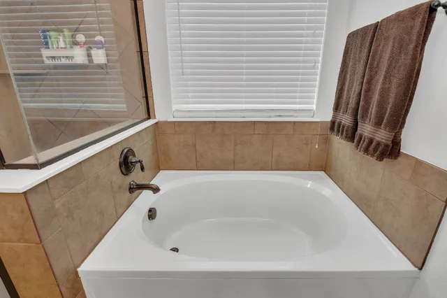 a bathroom with a bathtub