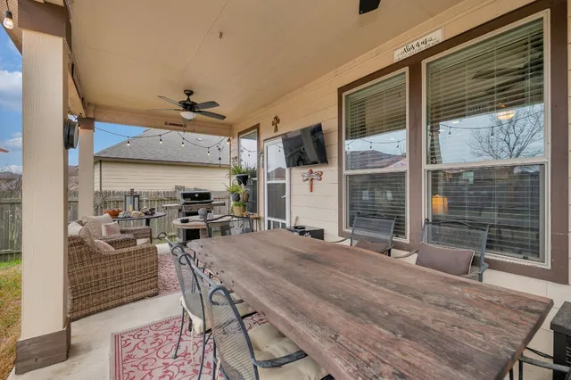 a view of a house with backyard porch and patio