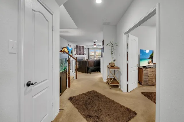 a view of a gallery with white walls