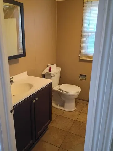 a view of wooden floor with a window
