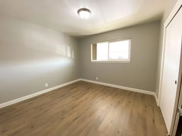 a bathroom with a toilet sink and a shower