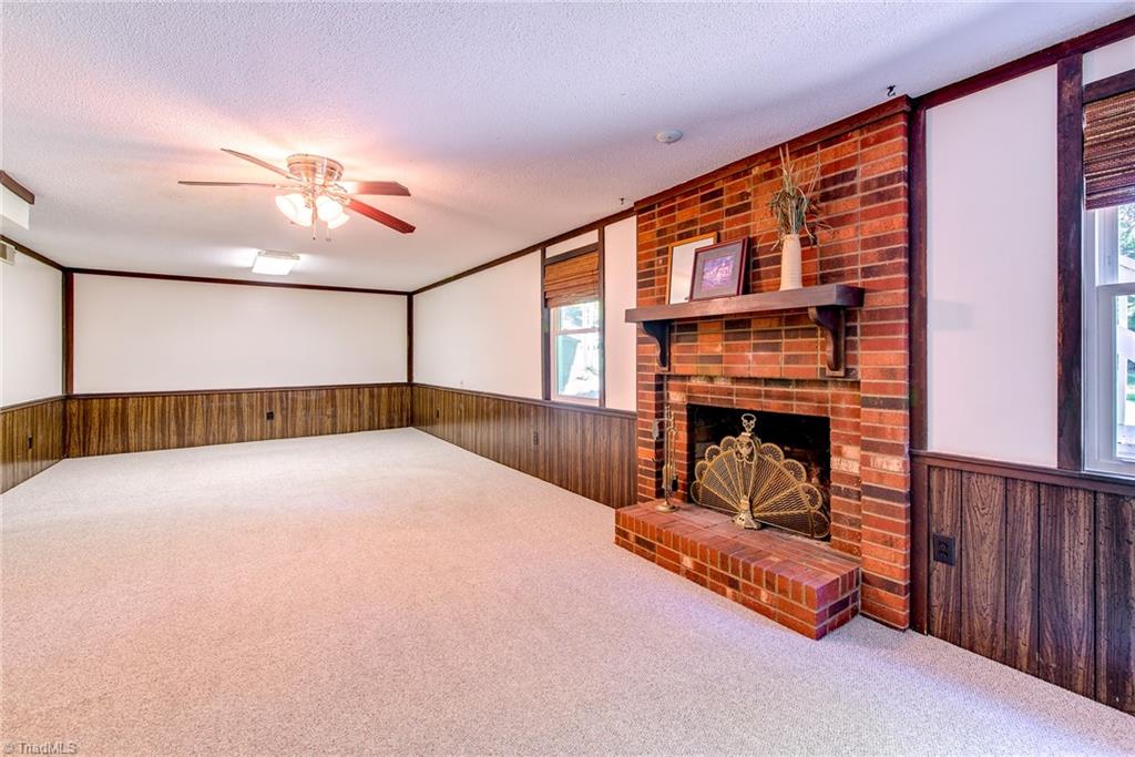 3510 Court Road Winston-Salem, NC 27106 - Photo 20 of 27 Finished Basement has fireplace, extra room and a half bath. Great extra space with multiple possibilities