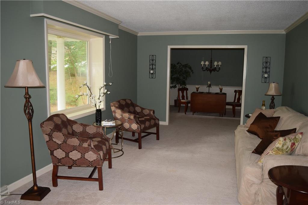 3510 Court Road Winston-Salem, NC 27106 - Photo 7 of 27 The stylish and roomy Living room has a large picture window facing the cul de sac and is open to the Dining Room