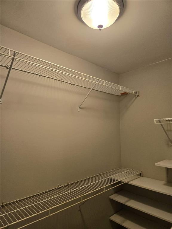 5315 Sherwin Drive Lilburn, GA 30047 - Photo 14 of 16 a view of a room with racks on the wall