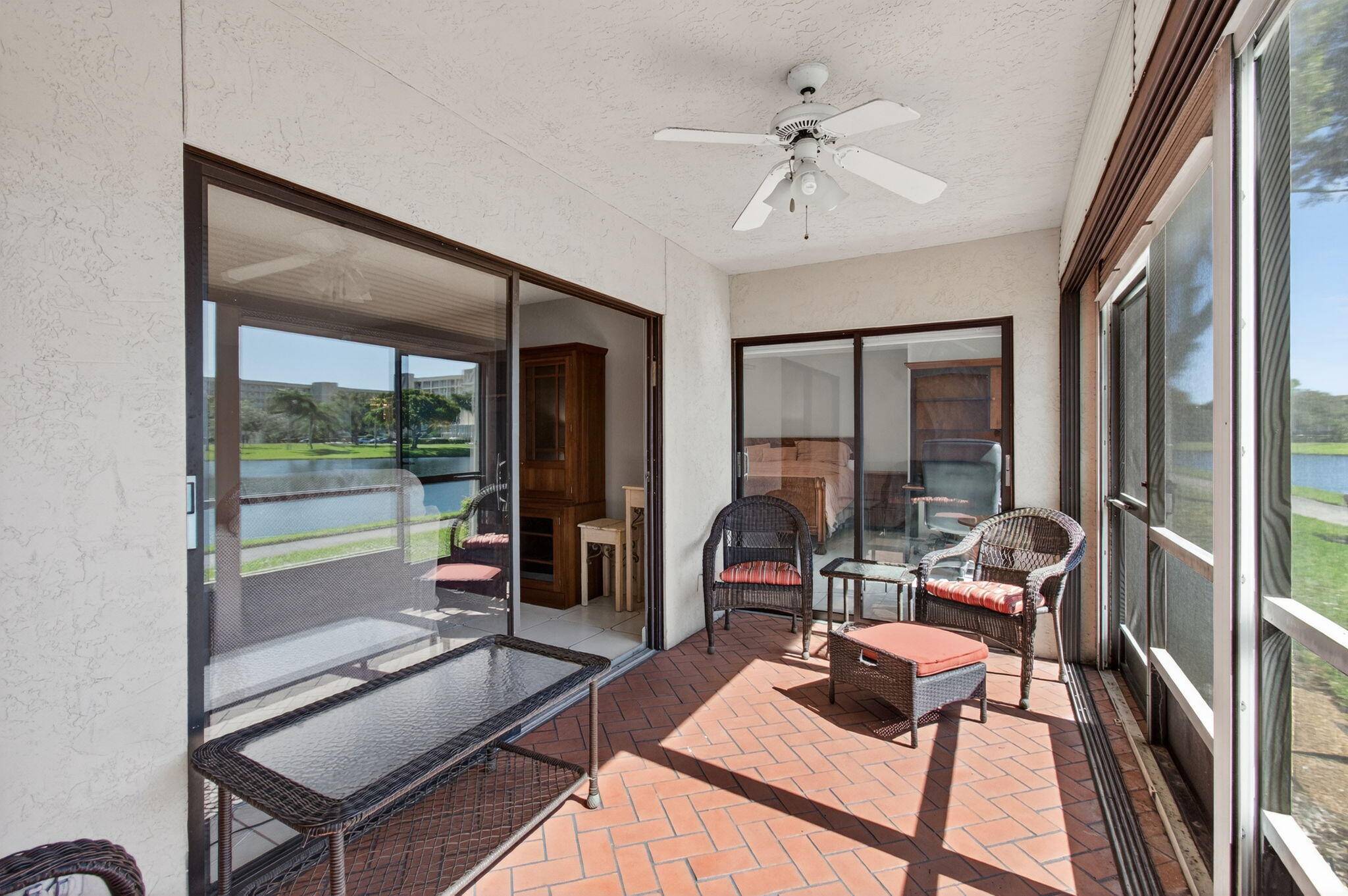 7340 Amberly Lane, Unit 101 Delray Beach, FL 33446 - Photo 20 of 90 a living room with furniture and a large window