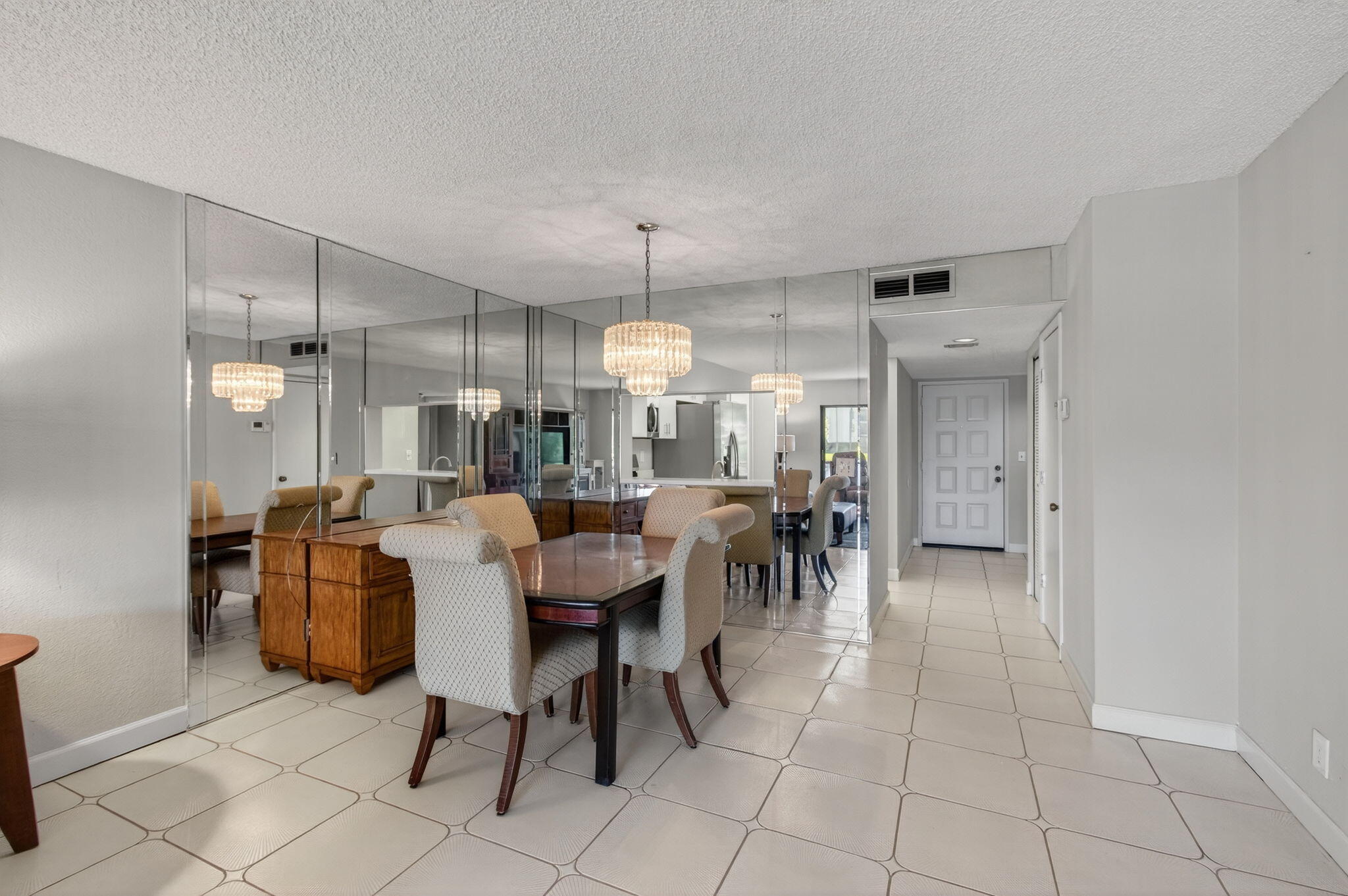 7340 Amberly Lane, Unit 101 Delray Beach, FL 33446 - Photo 23 of 90 a view of a dining room with furniture