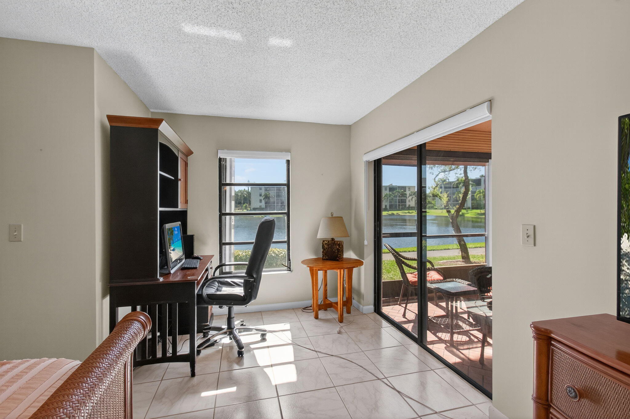 7340 Amberly Lane, Unit 101 Delray Beach, FL 33446 - Photo 34 of 90 a living room with furniture and a window