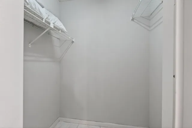 a living room with furniture a chandelier and a chandelier