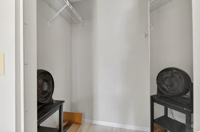 a view of a a dining room with furniture window and wooden floor