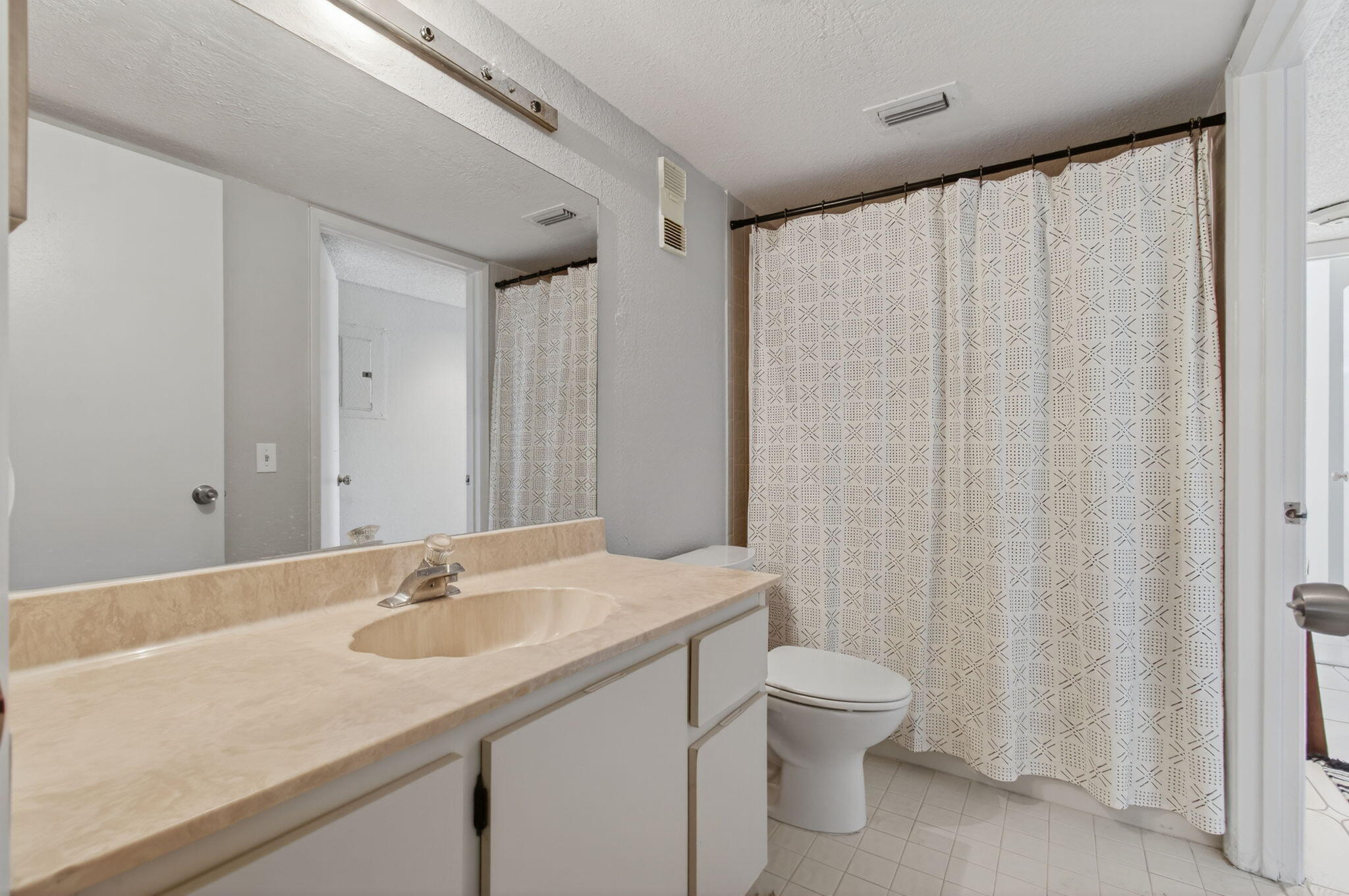 7340 Amberly Lane, Unit 101 Delray Beach, FL 33446 - Photo 48 of 90 a bathroom with a granite countertop sink toilet and shower