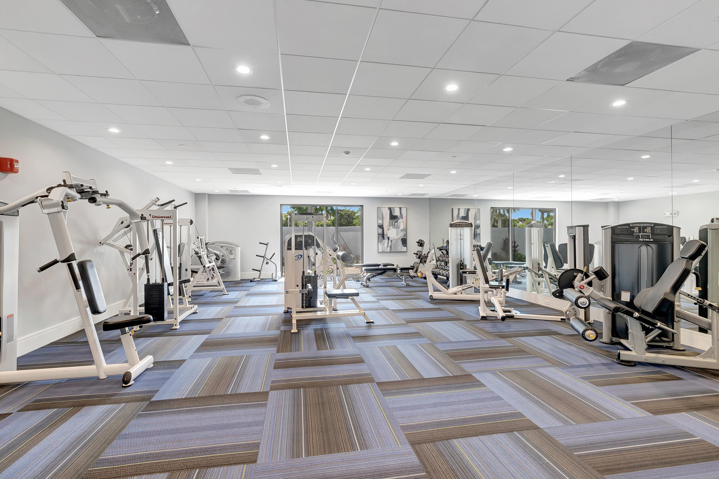 7340 Amberly Lane, Unit 101 Delray Beach, FL 33446 - Photo 70 of 90 a view of a room with gym equipment