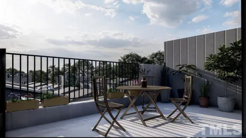 a view of a chairs and table in patio