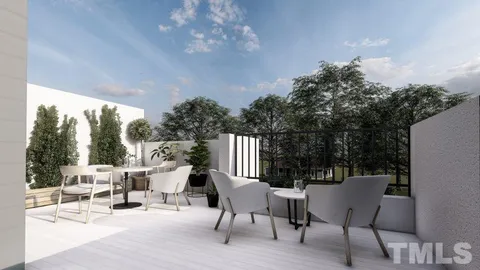 a view of a chairs and tables in the patio