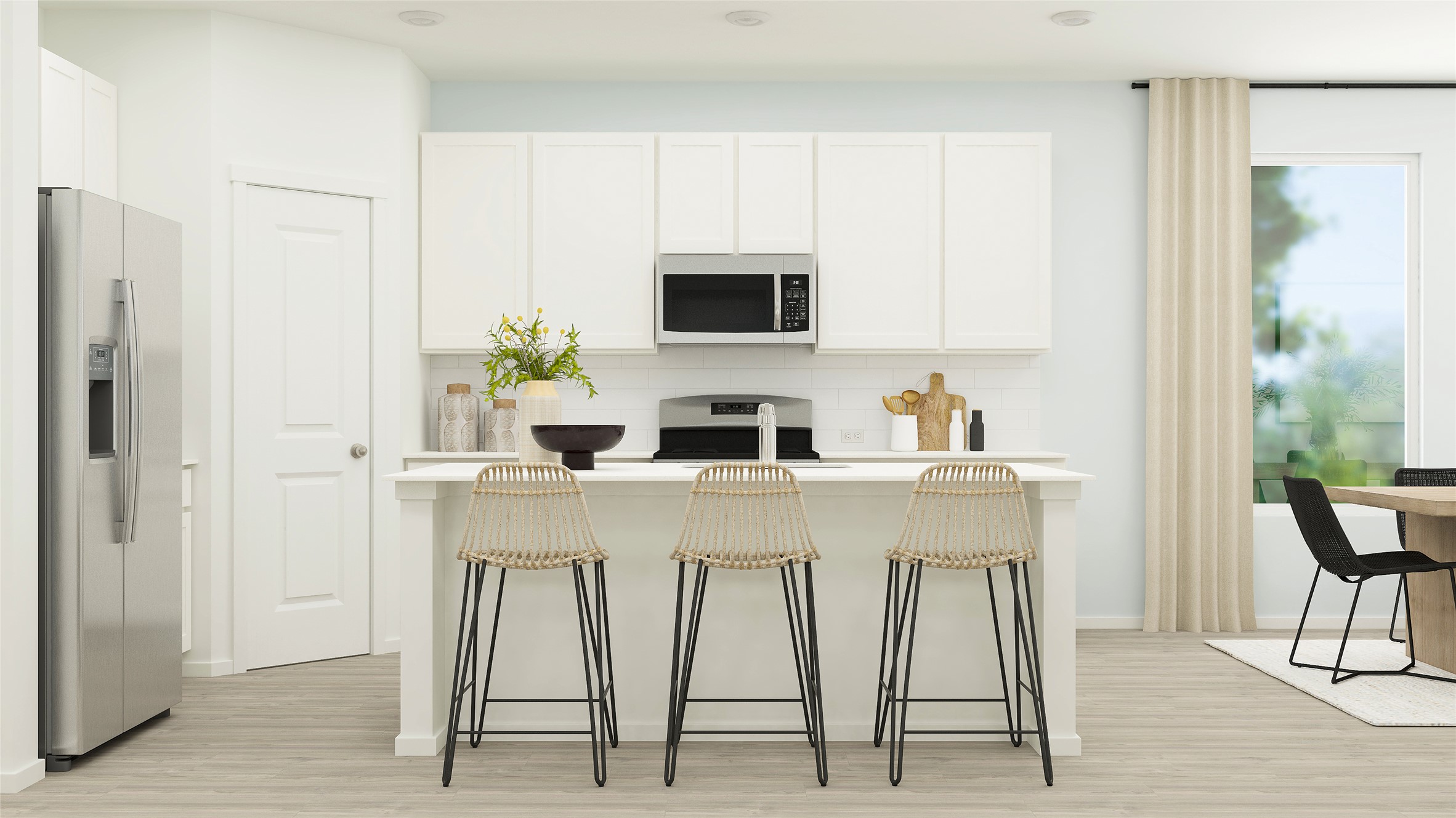 17911 Nashville Warbler Road Pflugerville, TX 78660 - Photo 11 of 22 a white kitchen with a stove a sink and a refrigerator