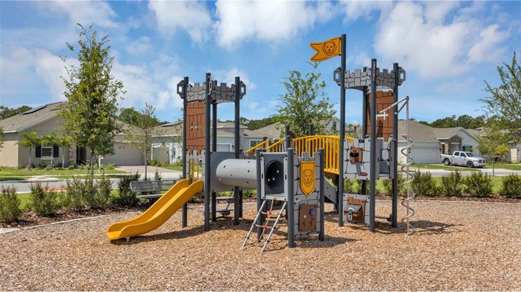 4754 Maple Cross Drive Kissimmee, FL 34746 - Photo 13 of 19 a view of a park with slide