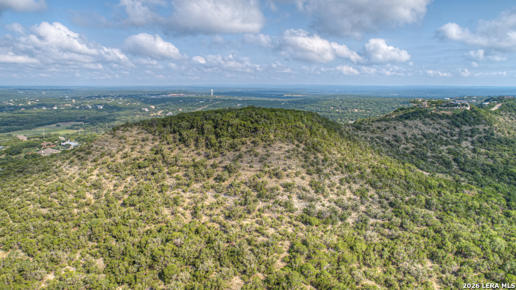 Tract 6 Holm Ranch Road Fischer, TX 78623 - Photo 11 of 13 a view of a lake with houses in the back