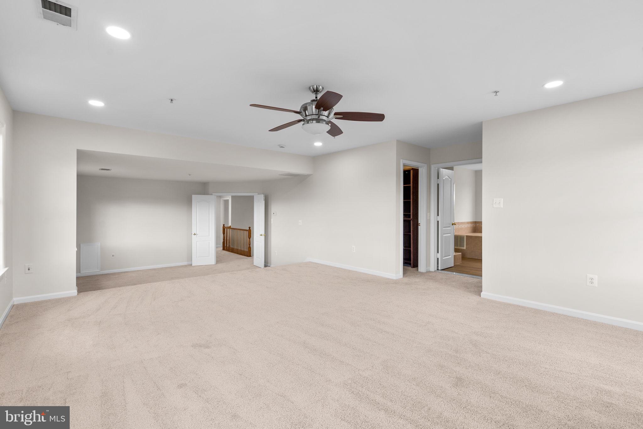 7604 Finglas Court Laurel, MD 20707 - Photo 29 of 48 a view of a livingroom with a ceiling fan