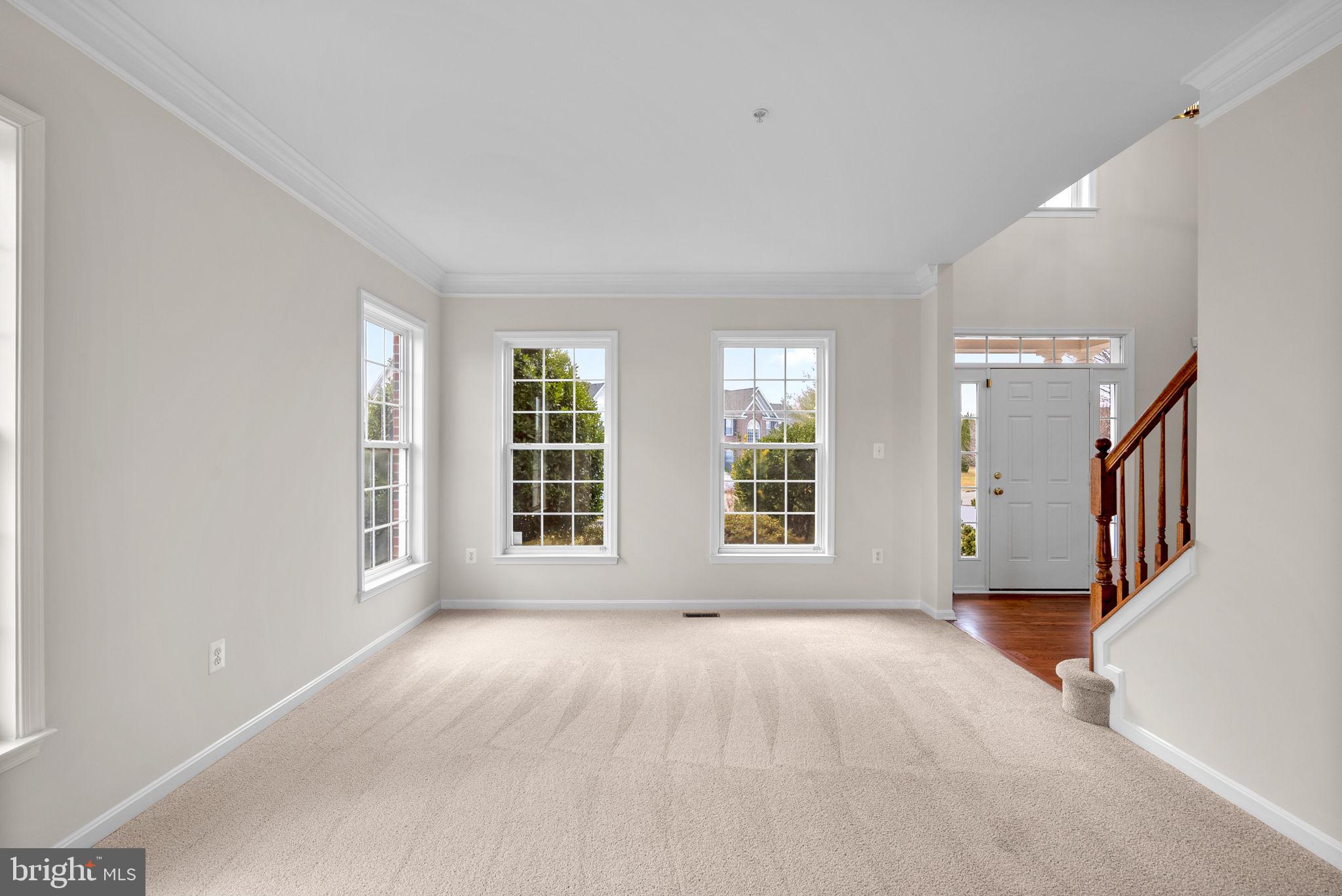7604 Finglas Court Laurel, MD 20707 - Photo 3 of 48 a view of an empty room with a window