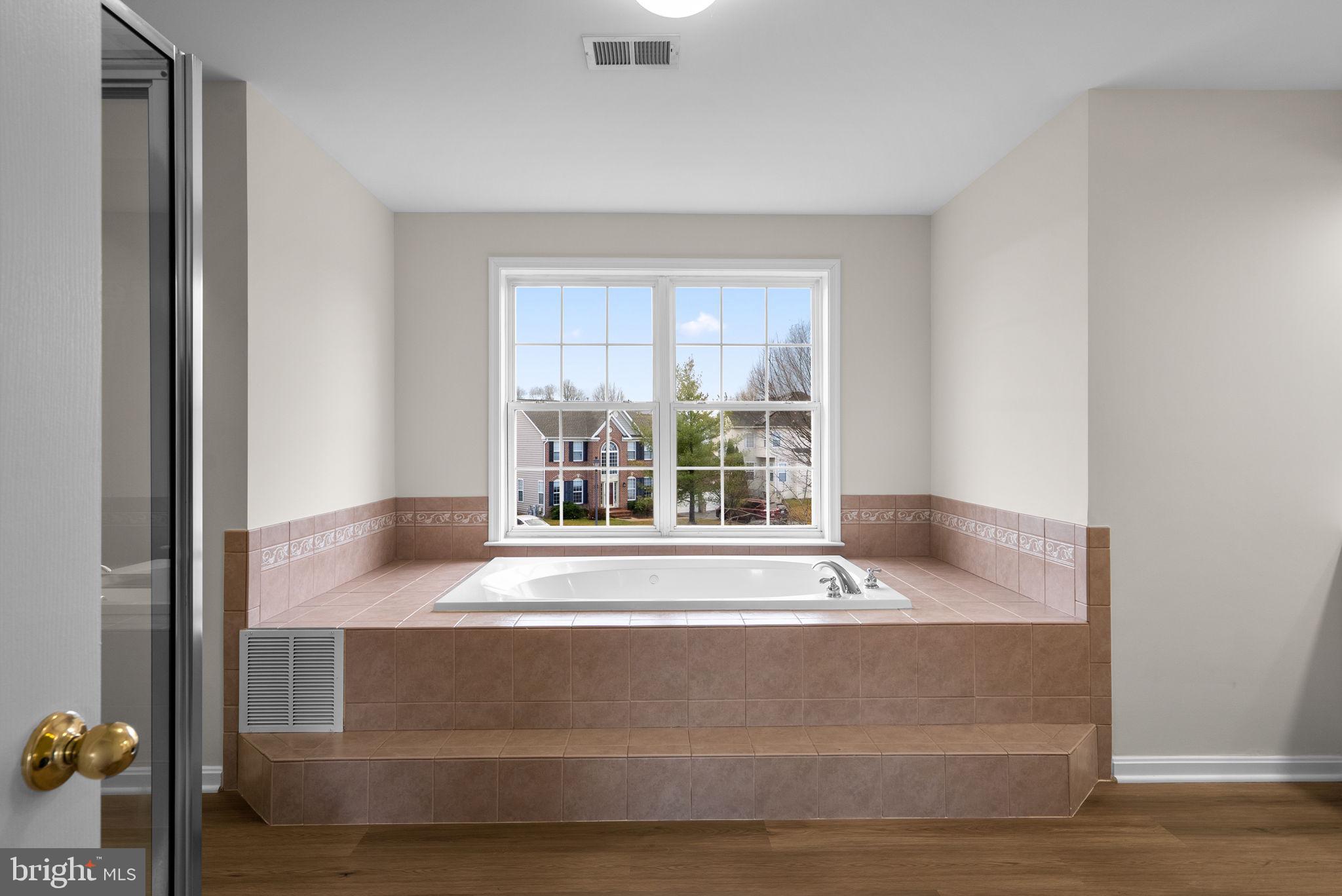 7604 Finglas Court Laurel, MD 20707 - Photo 32 of 48 a living room with furniture and a window