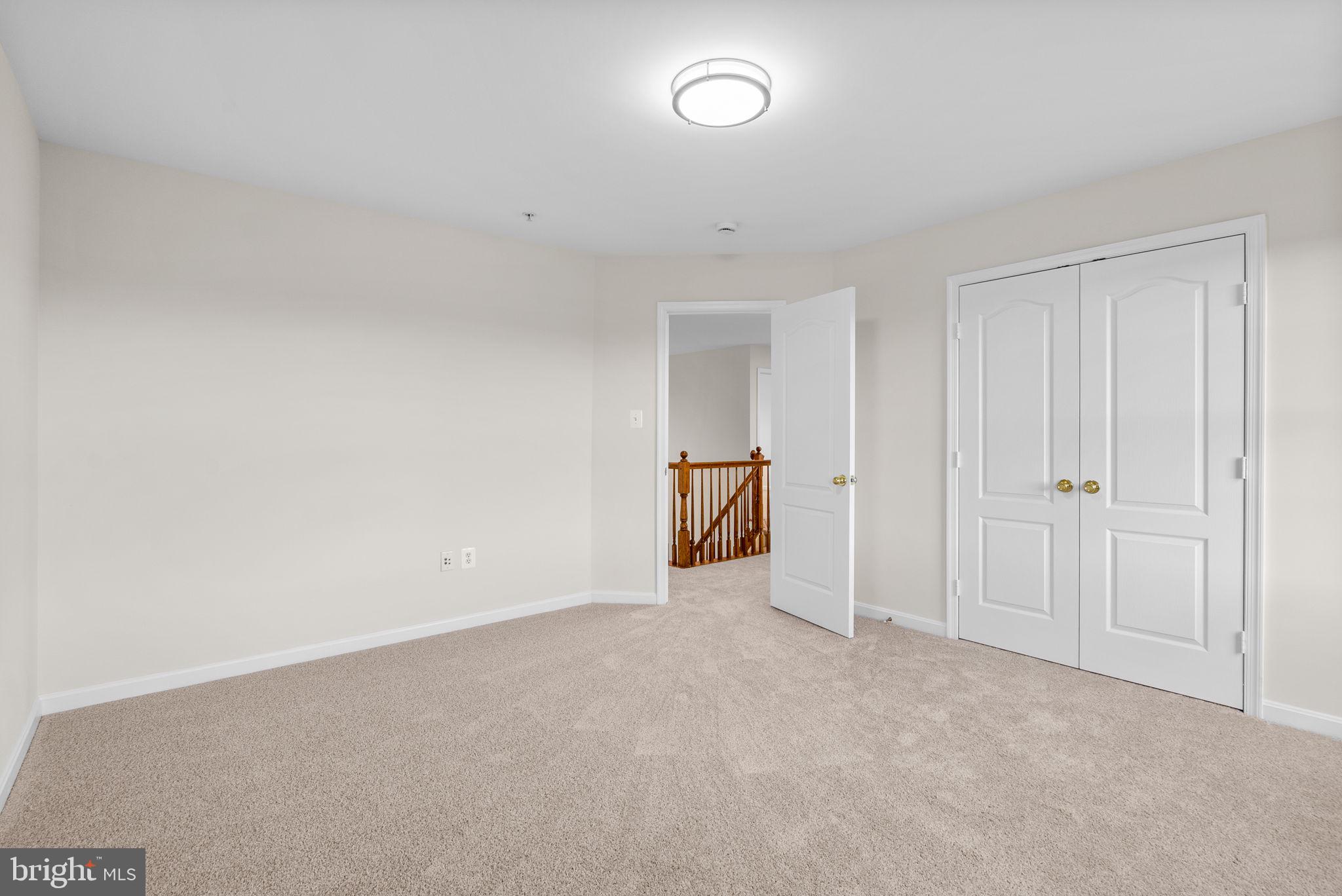 7604 Finglas Court Laurel, MD 20707 - Photo 37 of 48 a view of an empty room