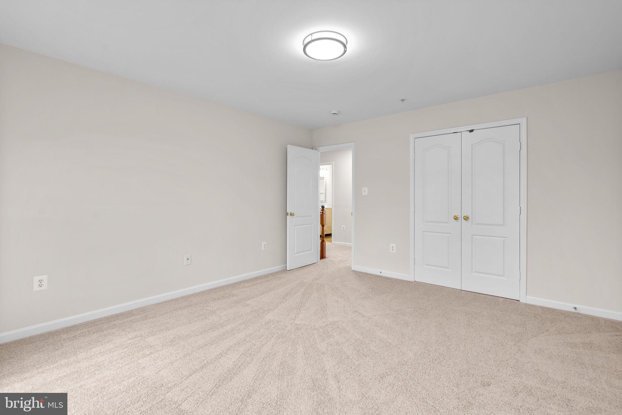 7604 Finglas Court Laurel, MD 20707 - Photo 44 of 48 a view of an empty room