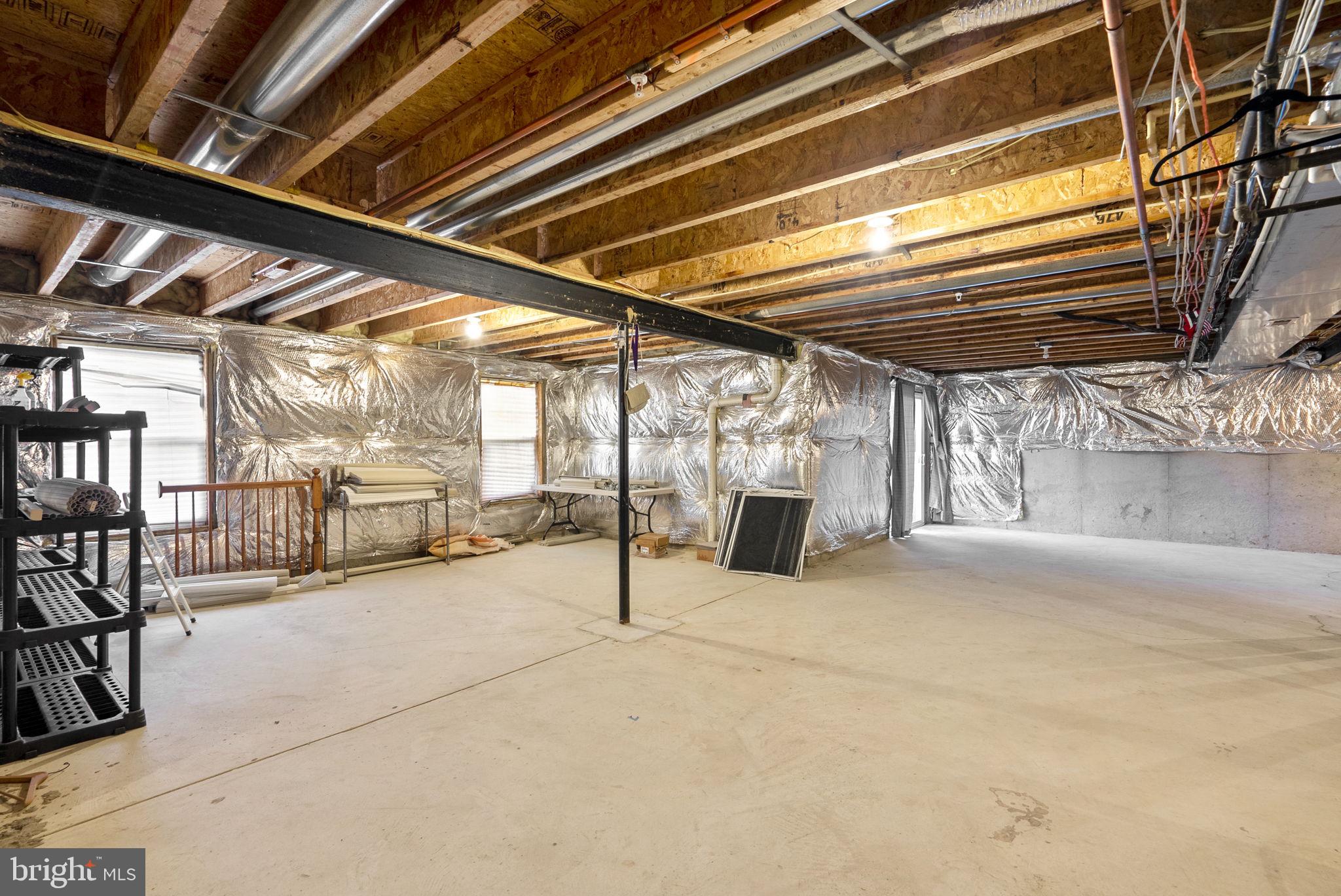 7604 Finglas Court Laurel, MD 20707 - Photo 45 of 48 a view of a garage with wooden floor