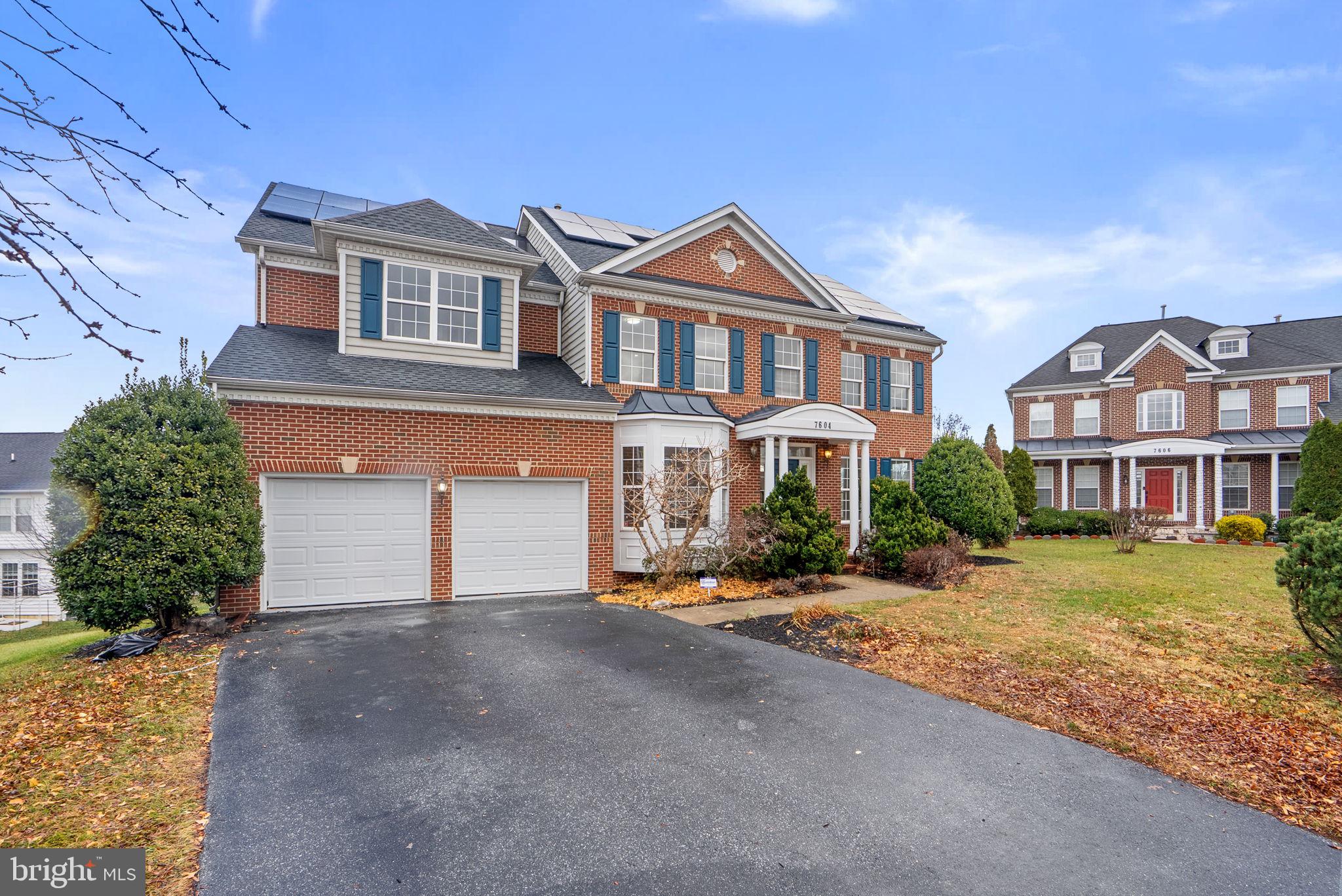 7604 Finglas Court Laurel, MD 20707 - Photo 48 of 48 a front view of a house with a yard