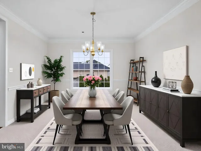 a view of a dining room with furniture and chandelier